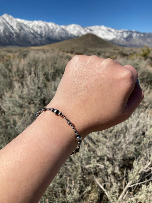 Stretchy thin Gradient Navajo Pearl Bracelet